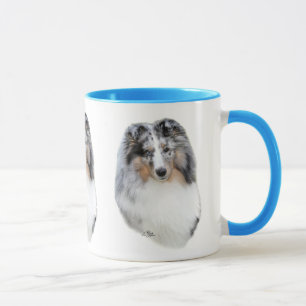 Die Shetlandinseln-Schäferhund (Sheltie) blaue Tasse