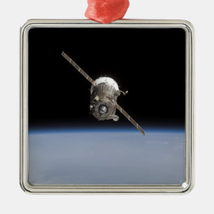 Die Sojus TMA-11 Raumsonde über dem Horizont der E Silbernes Ornament