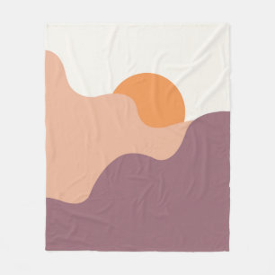 Die Sonne geht hinter den lila Hügeln herunter Fleecedecke