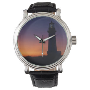 Die Sonnenkugel sinkt auf den farbenfrohen Horizon Armbanduhr