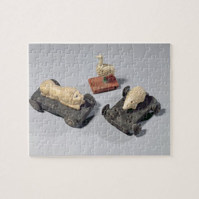 Die Spielwaren der Kinder: ein Igel, ein Löwe und Puzzle (Horizontal)