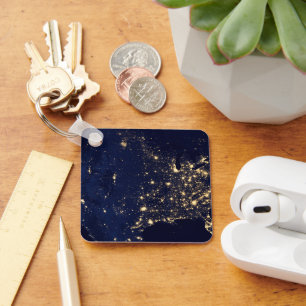 Die Stadtbeleuchtung der Staaten nachts. Schlüsselanhänger