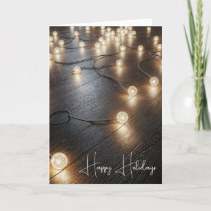 Die Tageslichter auf einem Holzfußboden Feiertagskarte