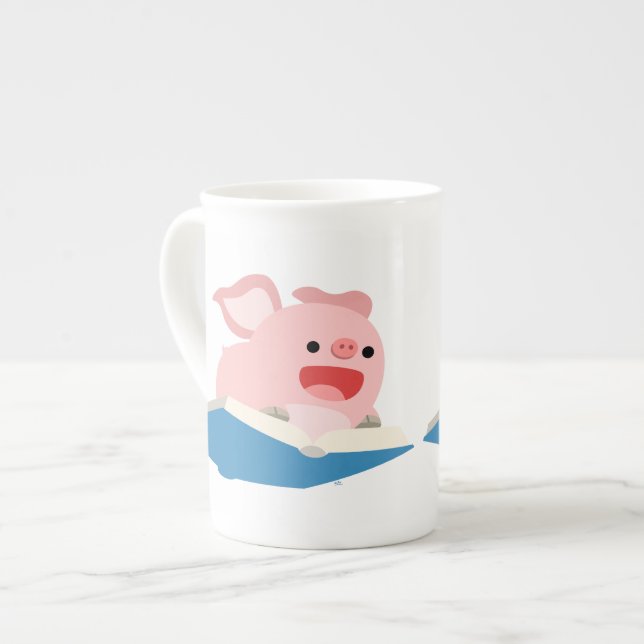 Die Tasse "Flying Book and Cartoon Pig-Bone-China" (Vorderseite Links)