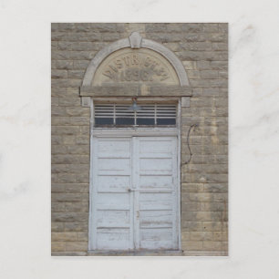 Die Tür zum Schulgebäude Postkarte