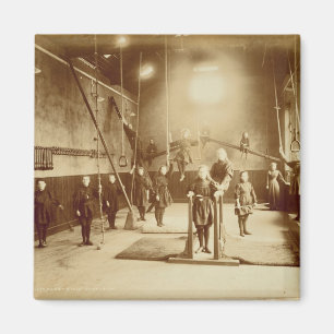 Die Turnhalle des Mädchens an der tauben und Magnet