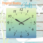 Die Uhr des Wandsteckplatzes mit tropischen Schatt<br><div class="desc">Wall Clock in einer Vielzahl von tropischen und ombre Tönen. Gut,  um eine Touch "Sommer" zu Ihrer Zuhause,  Hütte,  oder zum Geschenken hinzuzufügen.</div>