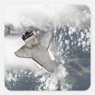 Die Unterseite des Space Shuttles Discovery Quadratischer Aufkleber