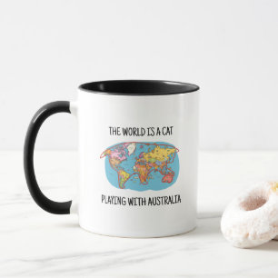 DIE WELT IST EIN KATZSPIEL MIT AUSTRALIEN TASSE