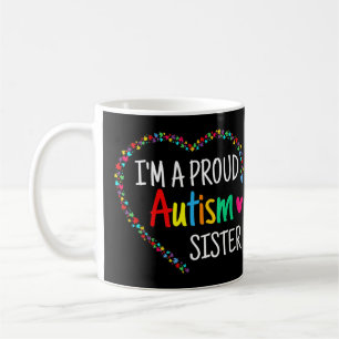 Dieses farbenfrohe autistische Herz aus Puzzleteil Kaffeetasse