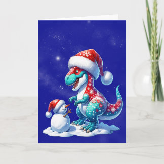 Dinosaur mit Weihnachtsmannmütze baut einen Schnee Feiertagskarte
