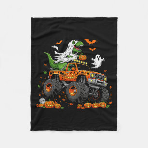 Dinosaur T-Rex fährt auf Monstertruck Halloween Mä Fleecedecke