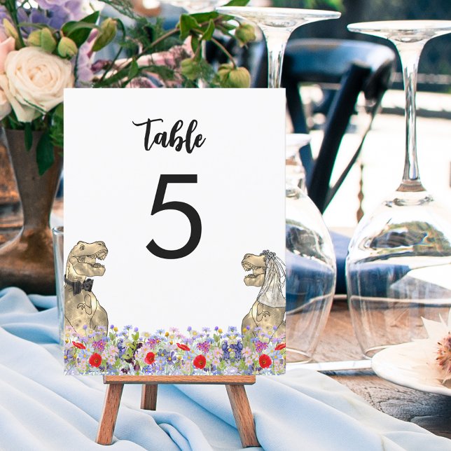 Dinosaur Theme Wedding (Dinosaur themed wedding T-Rex bride and groom and colorful wildflowers table number sign)