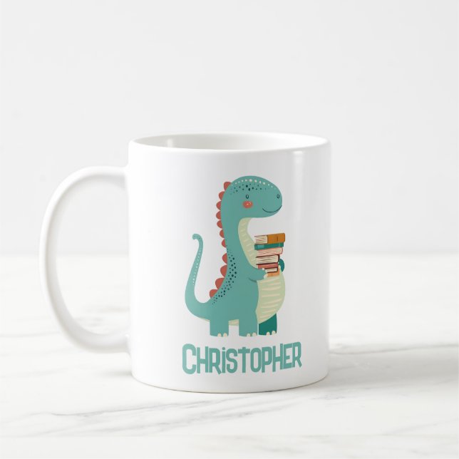 Dinosaurier-Buch mit Kindername Kaffeetasse (Links)