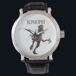 Dinosaurier Raptor Name Monogramm Armbanduhr<br><div class="desc">Dieses Design kann in dem Bereich personalisiert werden, der durch das Ändern des Fotos und/oder Textes zur Verfügung gestellt wird. Sie können auch angepasst werden, indem Sie auf Vorlage personalisieren klicken und dann auf die Schaltfläche klicken, um weitere Optionen anzupassen, um die Hintergrundfarbe zu löschen oder zu ändern, Text hinzuzufügen,...</div>