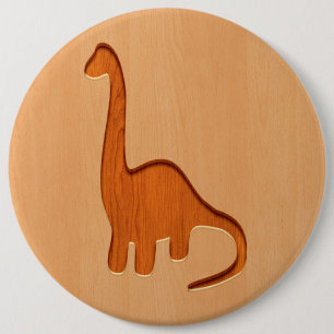Dinosaurier-Silhouette graviert auf hölzernem Button