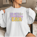 Disco Vibes Retro Groovy Sweatshirt<br><div class="desc">Mit diesem Disco Vibes Retro Groovy Bridesmaid Era Sweatshirt können Sie stilvoll glänzen! Dieses gemütliche und trendige Crewneck mit nostalgischem 70er-inspiriert Design mit kühnen Blasen-Buchstaben, Pastelltönen, Blitzschrauben und einer Diskokugel für mehr Glanz ist der ideale Ort, um Ihre Rolle im Brautspiel zu feiern. Egal, ob Sie auf dem Weg zu...</div>