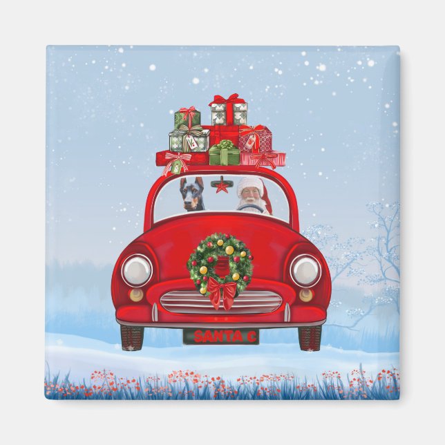 Doberman Hund in Auto mit dem Weihnachtsmann Magnet (Vorne)