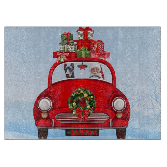 Doberman Hund in Auto mit dem Weihnachtsmann Schneidebrett (Vorderseite)