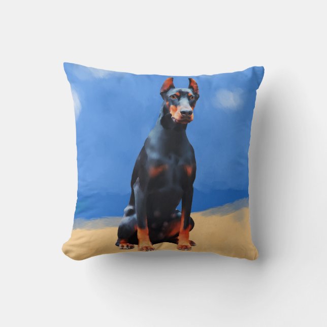 Doberman Hund sitzt am Strand Kissen (Vorderseite)