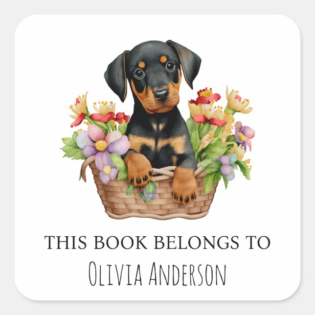 Doberman Puppy in Blume Basket Dieses Buch gehört Quadratischer Aufkleber (Vorderseite)