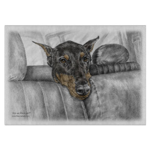 Doberman Riding im Auto Schneidebrett