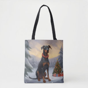 Dobermann-Hund im Schnee Weihnachten 