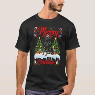 Dobermann-Hund zündet Weihnachtsbaum Santa Doberma T-Shirt