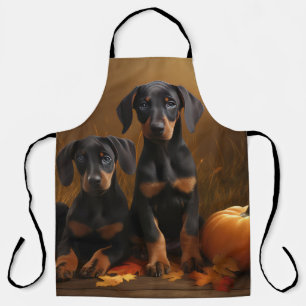 Dobermann-Welpe Herbstfreude Kürbis  Schürze