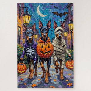 Dobermänner in Halloween-Kostümen beim Trick-or-Tr Puzzle