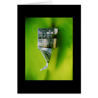 Dollar-Bill Origami Elephant auf grünem Hintergrun