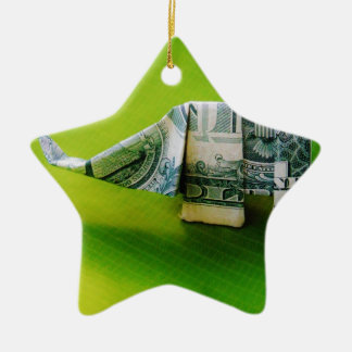 Dollar-Bill Origami Elephant auf grünem Hintergrun Keramikornament