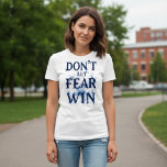 Don’t Let Fear Win T-Shirt<br><div class="desc">Stand strong in faith with the Unshakable Warrior “Don’t Let Fear Win” tee. Designed for both men and women,  this bold Christian design reminds you to trust God over fear. Available in multiple styles and colors to fit your everyday look. 💪✝️</div>