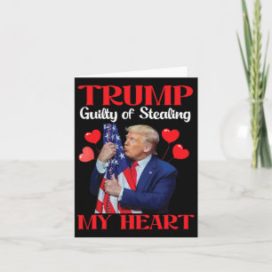 Donald Trump mit der Fahne Trumps, der die Schuld  Karte