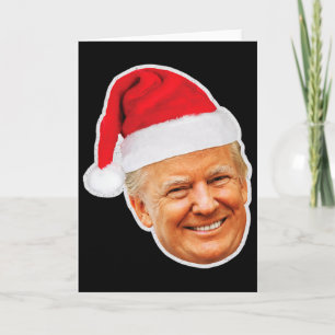 Donald Trump mit einer Weihnachtsmannmütze Unterst Karte