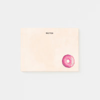 Donut mit rosa Zuckerguss und Sprinklen