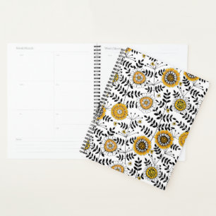 Doodle-Blume und -Blätter in Gelb und Schwarz Planer