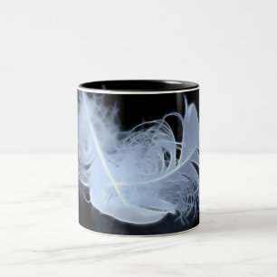Doppelflammenfedern und -reflexion zweifarbige tasse