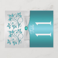 Doppelseitige Aqua-Tischnummer und silberne Blüten