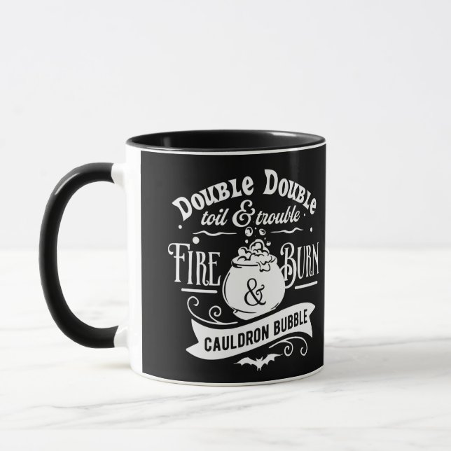 Doppeltoil und Trouble Cauldron Halloween Tasse (Links)