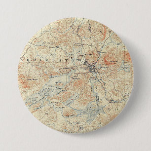 Dorf und Gebiet des Saranac Sees in Adirondacks Button