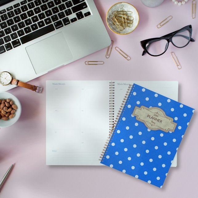 Dotty Delight Blue Planer (Dotty Delight Blue Planner on the desk. )