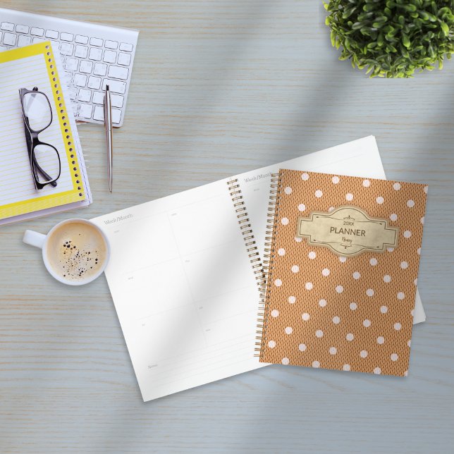 Dotty Delight Orange Planer (Dotty Delight Orange Planner on the desk. )