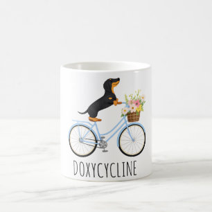 Doxycyclin-Apotheke Pun, Dachshund auf Fahrrad,  Kaffeetasse