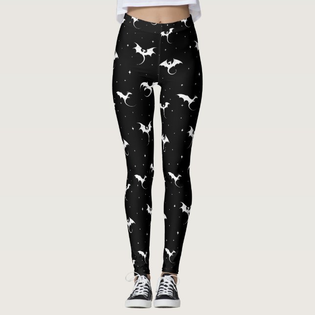 Drachen und Sterne auf schwarzem Hintergrund Leggings (Vorderseite)