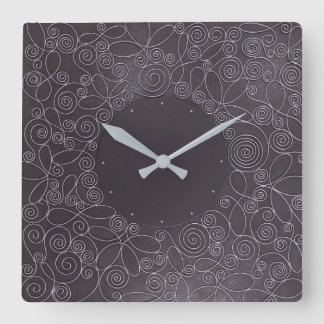 Drahtverzierungen auf schwarzem Hintergrund Quadratische Wanduhr