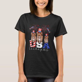 Drei amerikanische Cockapoos-Hunde mit amerikanisc T-Shirt