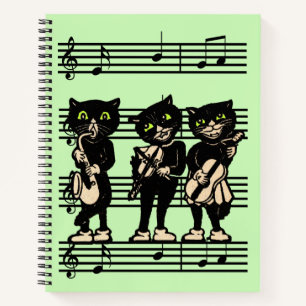 Drei Black Cat Musicians auf Sheet Music Green Notizbuch