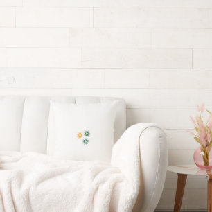 drei Blume mit grünen und orangefarbenen Blättern Kissen