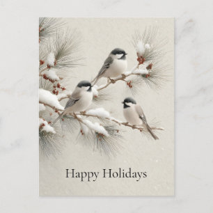 Drei Chickadees auf einem schneebestäubten Kiefern Feiertagspostkarte